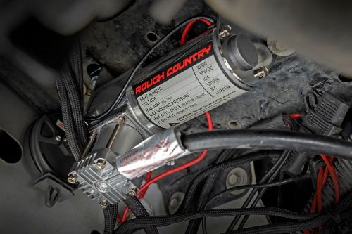 Compressor Dimensions: Length: 7" x Width: 2.75 x Height: 5" Moisture and dust resistant unit. Includes DOT approved air lines. Duty cycle 9% @ 100 PSI, Recommended max working pressure 120 PSI. Includes gauge and all necessary wiring and airline to tie into existing airbag kit. Kit includes a low-pressure sensor to maintain proper bag inflation. Rough Country 12volt 1.03 CFM Compressor.