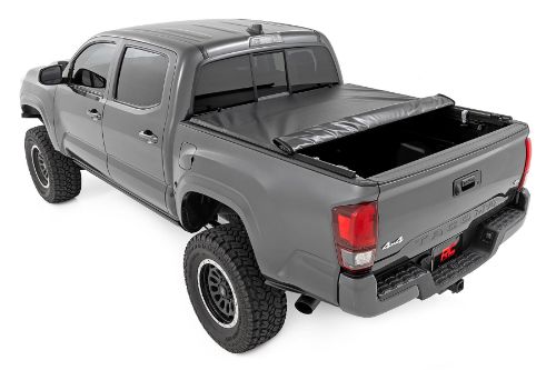 High-quality marine grade vinyl bed cover in a stylish matte black finish. Roll-up design allows quick access to cargo and full bed access quickly and conveniently. Sleek and stylish top mount cover that sits 1-1/8" high. Corrosion resistant black powder coated aluminum frame. Spring latch closure system locks in place keeping the cover tight and noise free. Single cable pull for easy latch release and access. Heavy Duty hook and loop side closure protects cargo from the elements. No drill easy install and removal - all tools included. 5 Year Warranty.