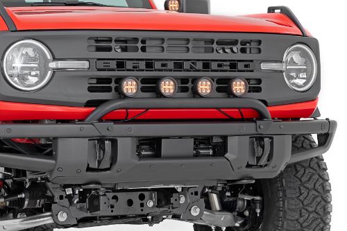 Tube style light bar mount for the factory modular bumper. Holds up to 4 of the 6.5" Round lights. Holds up to 6 of the 3.5" Round lights. Light bar mount is 11 Gauge material. Tube is 1 7/8" OD. Bolts to factory mounting points on bumper. Can be run just as a low bar option without lights.