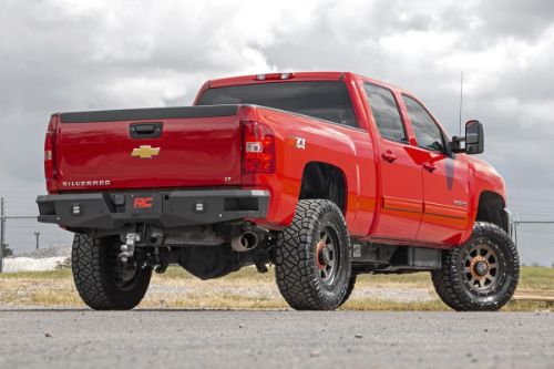 Easy to install! Durable, steel construction Includes (2) Rough Country LED Cubes Integrated steps for easy access to bed Retains factory receiver hitch Includes backup sensor relocators