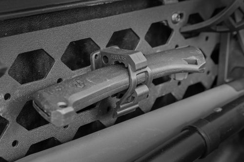 One clamp per package. Holds tools and equipment from 1 3/4" to 2 1/2" diameter. Each clamp supports a safe working load of 50lbs. Mounts with two 6mm bolts. Mounting area 1" x 3 1/2" Includes mounting hardware compatible with Rough Country Molle panel pattern and other Military panel patterns.