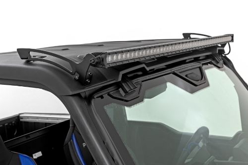 Handy, forward-facing illumination. Easy, 100% bolt-on installation. Mounts to lower roll cage using factory hardware. Light bar sits above the windshield for unobstructed viewing. IP67 Waterproof design. Durable, die-cast aluminum housing. Includes snap-on cover and premium wiring harness.