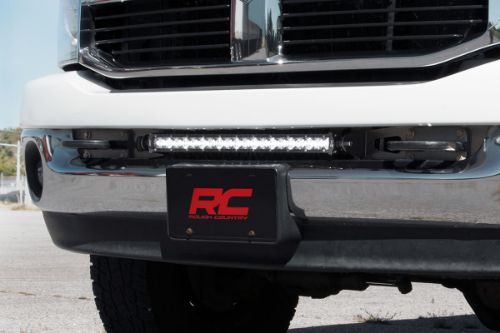 Easy bolt-on install Factory appearance Maintains front factory tow hooks Brackets mount hidden away from view 7200 lumens 100 watts Contains 20, 5 watt High Intensity CREE LEDs 30 degree spot beam IP67 Waterproof rating Black panel design Moisture Breather technology reduces moisture build-up behind the lends Noise Silencers eliminate hum, whistle, and other wind noises associated with mounted LED Light bars Includes premium, flat-wound wiring harness with on/off switch Features both end mounts and adjustable base mounts for multiple mounting solutions Durable die-cast aluminum housing 3 year warranty
