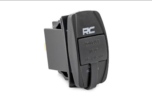 Dual USB Charger. Fits in standard rocker switch housing. Overcharging and surge protection. Compatible with devices using USB 2.0. Laser-etched RC with blue backlighting. Mounting size: 1.41 x .86 inches Surface size: Standard 2in x 1in Input: DC 12v-24v Output:DC 5v 3.1A