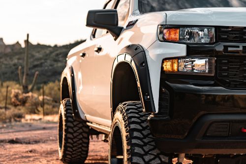 Low Gloss Black KoradÎ“Ã¤Ã³ UV Protected. 2 inches of extra tire coverage. Protects vehicle from on & off-road debris. Installation hardware included. No drill installation with tough corrosion-resistant hardware. Unpainted flares include a UV-protected KoradÎ“Ã¤Ã³ low gloss cap to keep them looking new for years. Limited Lifetime Warranty.