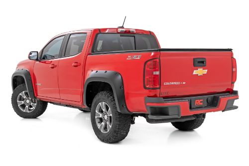 Color: Unpainted - Flat Black Tire Coverage: 2 in. Flare Height: 5.5 in. Simulated riveted look Quick and easy install with no drilling Added protection from rocks, mud and other road debris UV protected to prevent fading Built from a special Tri-Blend ABS material for maximum strength and durability Easily paintable to color match your truck Can be removed to bring truck back to stock 3-year limited warranty