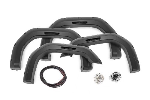 Color: Flat Black Tire Coverage: 2 in. Flare Height: 6.5 in. Simulated riveted look. Quick and easy install with no drilling. Added protection from rocks, mud and other road debris. UV protected to prevent fading. Built from a special Tri-Blend ABS material for maximum strength and durability. Easily paintable to color match your truck. Can be removed to bring truck back to stock. 3-year limited warranty.