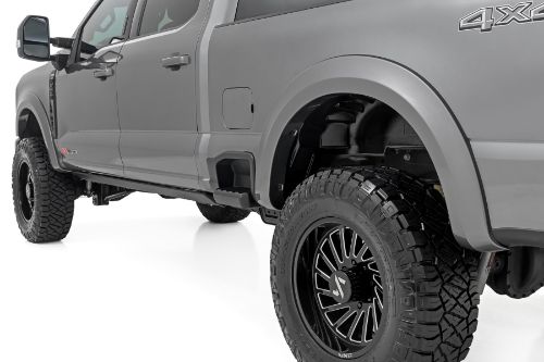 Coverage: 1ΓÇ¥ Flare Height: 5.75ΓÇ¥ Quick and easy install with no drilling. Added protection from rocks, mud, and other road debris. UV protected to prevent fading. Built from a special Tri-Blend ABS material for maximum strength and durability. Easily paintable to color match your truck. Can be removed to bring the truck back to stock. 3-year limited warranty.